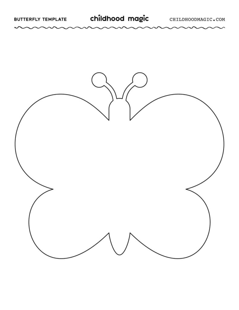 A colorful finished butterfly craft displayed on a wooden table