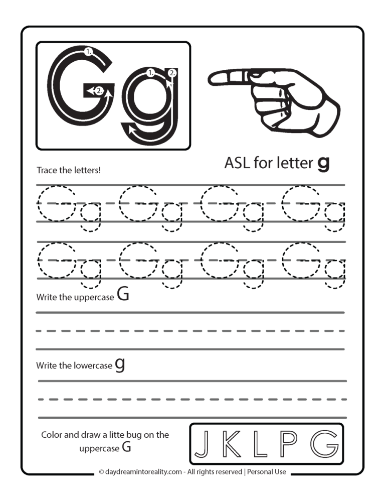 A close-up view of a child carefully holding a pencil to trace letters on paper.