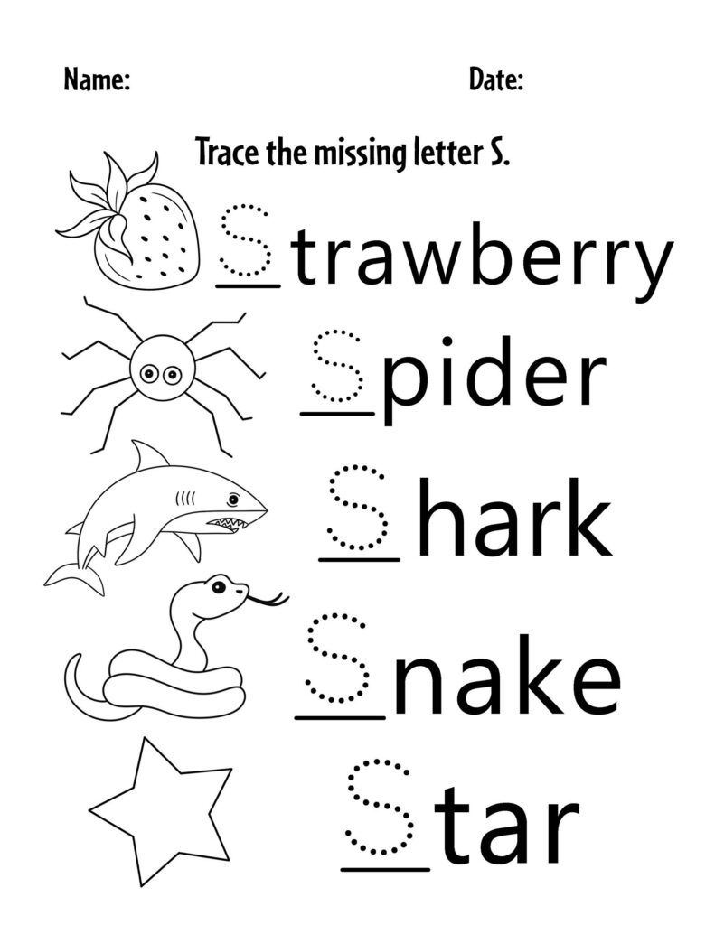 A young child holding a colorful crayon while tracing the letter S on a worksheet