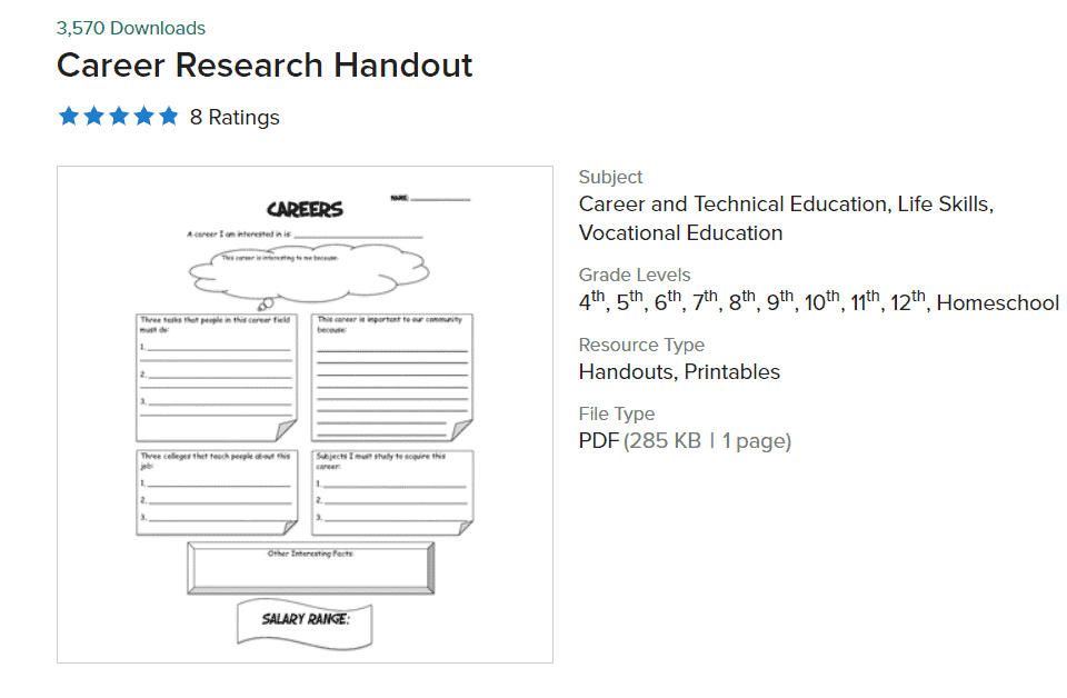 Close up of a hand holding a printed goal worksheet