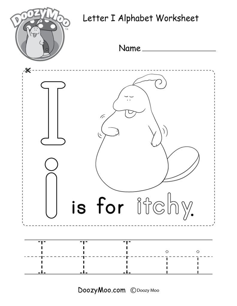 A young child carefully tracing the letter i on a paper worksheet