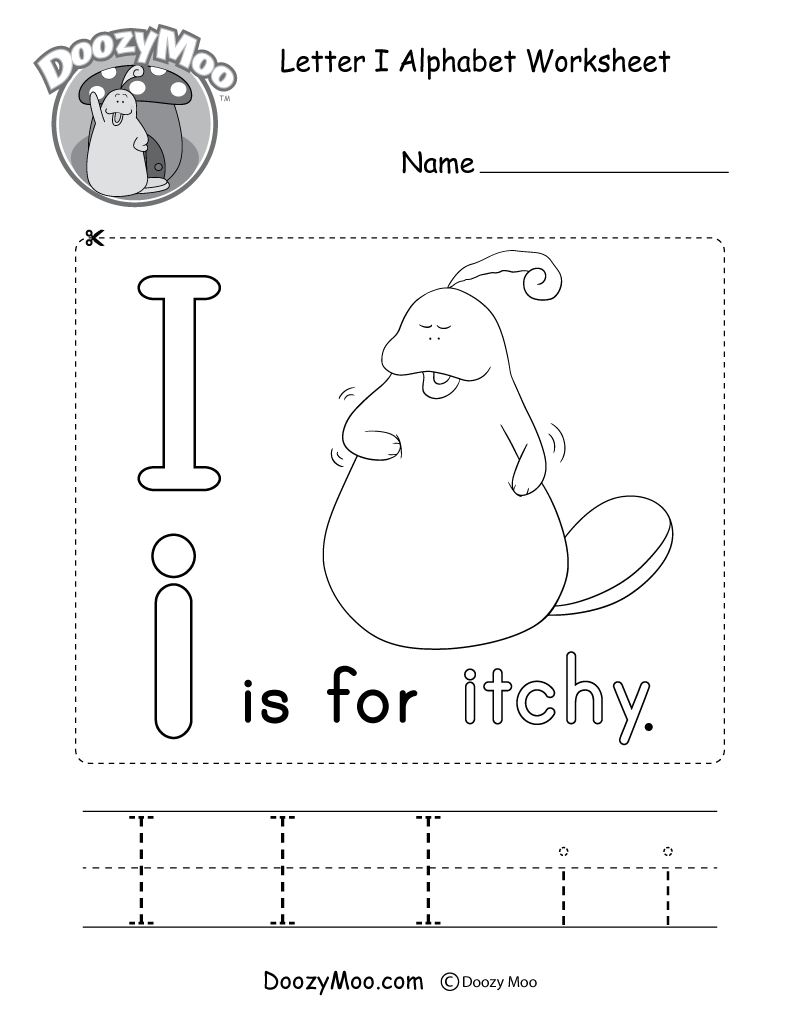 A young child carefully tracing the letter i on a paper worksheet