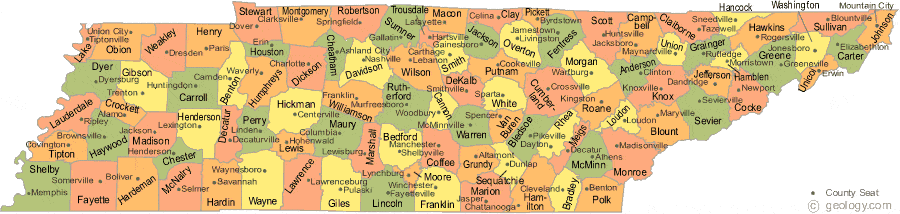 A homeschool student writing notes next to a state map