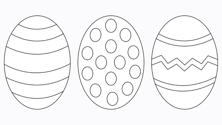 A preschool child coloring an egg shape on paper at a table