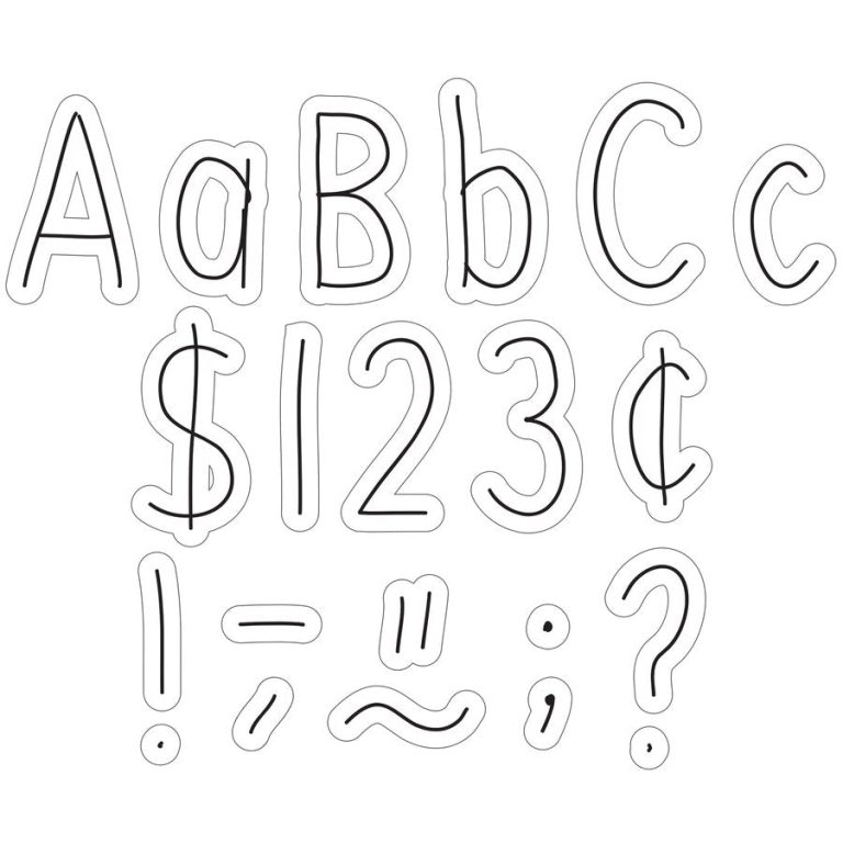 Close up of a young child holding a pencil correctly on a paper alphabet template.